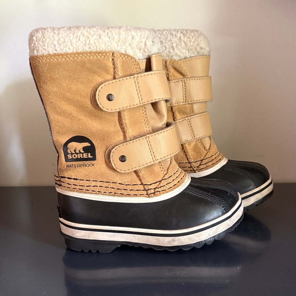 Sorel Tan and Black Winter Boots
